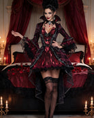 Dark red gothic corset dress with stand collar, lace sleeves, ruffled skirt and stockings