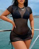 Black sheer mesh cover-up with front cutout bodice and ruched mini skirt