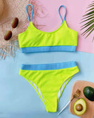 Neon green ribbed crop bikini set with blue trim, matching scoop top and high-waist briefs