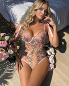 Pink floral embroidered sheer bodysuit teddy with plunge underwire and tie straps