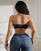 Black strapless bandeau top, back view with center band and buckle closure