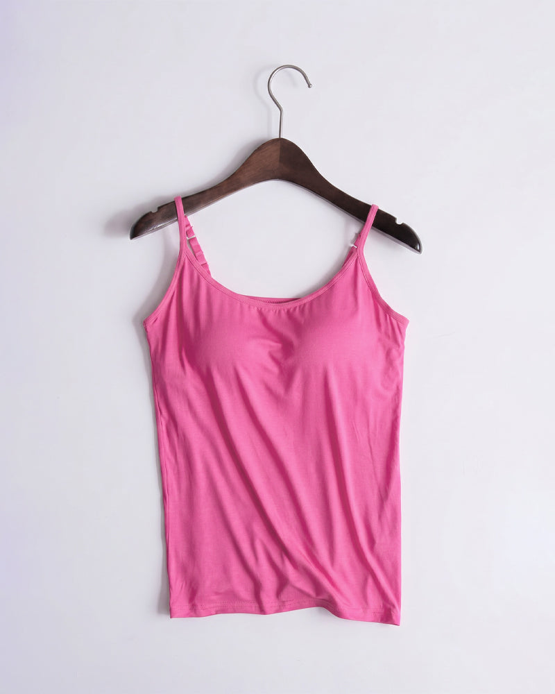 Pink built-in bra spaghetti strap tank top on wooden hanger