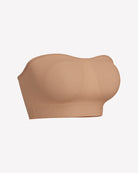 Skin-toned strapless bandeau bra with molded chest pads and ribbed hem