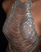 Silver rhinestone halter top with dense layered chain rows and sparkle drape