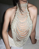 Multi-layer pearl halter top close-up with dense cascading beaded fringe
