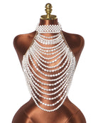 Multi-layer pearl halter top on mannequin, cascading white pearl fringe front