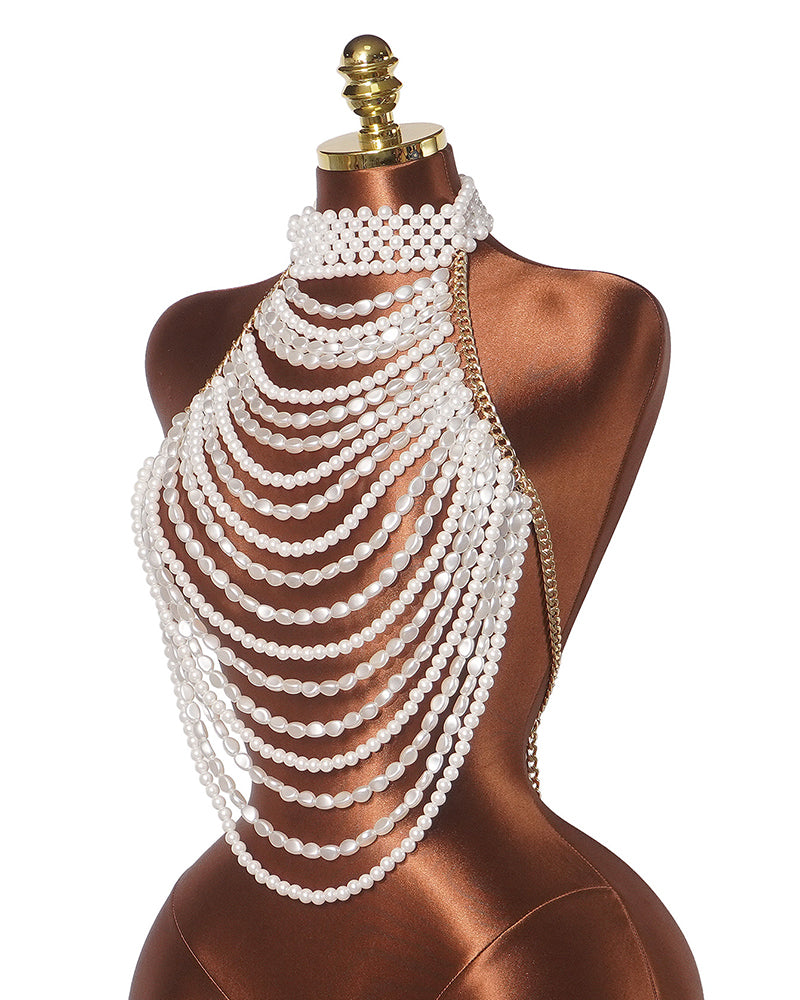 Multi-layer pearl halter top on mannequin, side view of cascading pearl fringe