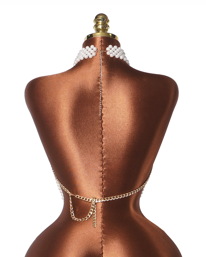 Multi-layer pearl halter top back view with gold chain tie and pearl strings