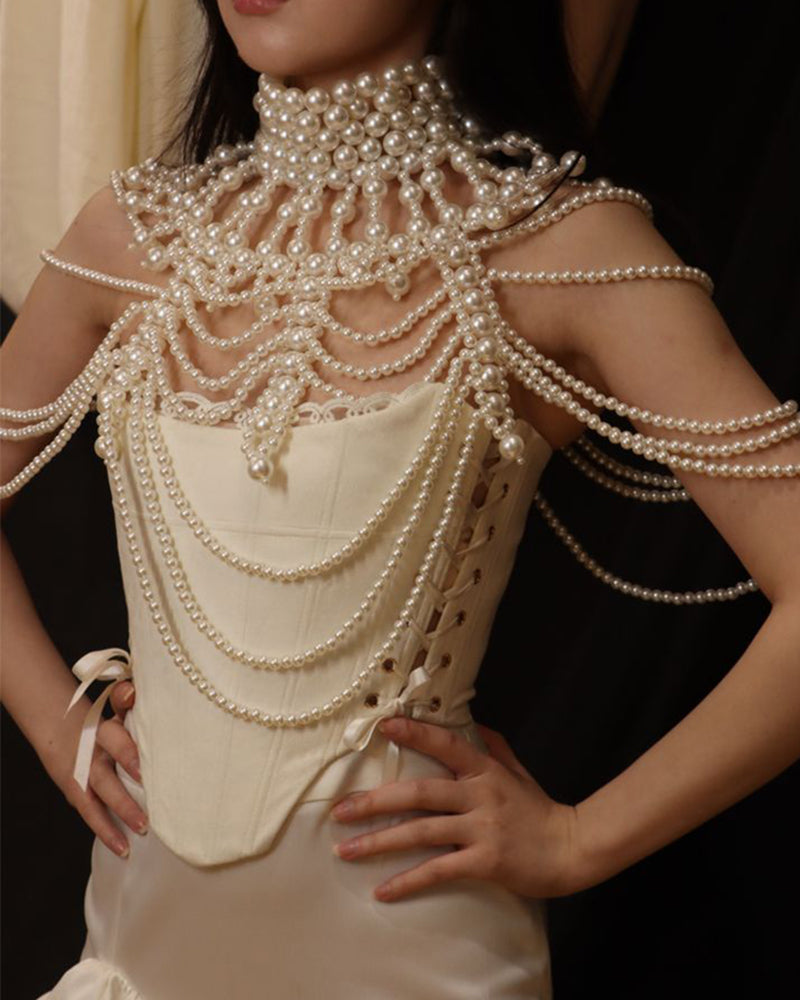White pearl fringe halter top with layered pearl chains and scalloped bead clusters.