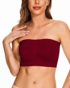 Wine red strapless bandeau bra on model with mesh side panels