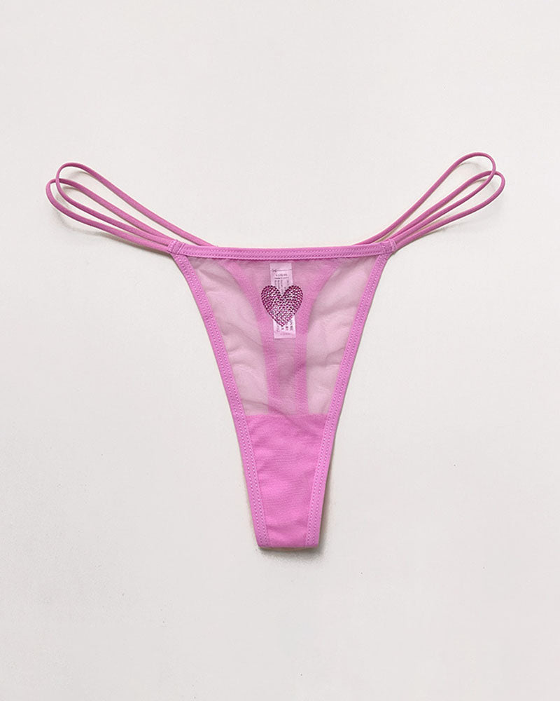 Light pink sheer mesh thong with rhinestone heart and triple strap ties.