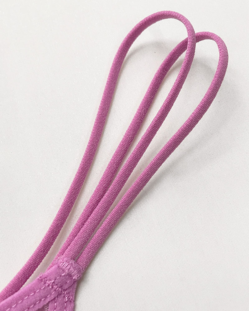 Pink thong strap ties with triple loops and stitched trim.
