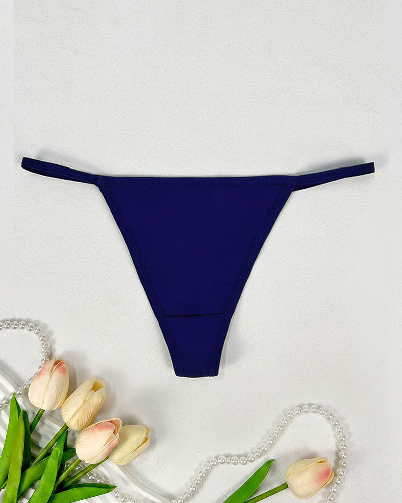 Seamless low-rise thong panties in dark blue, smooth minimal-coverage design.