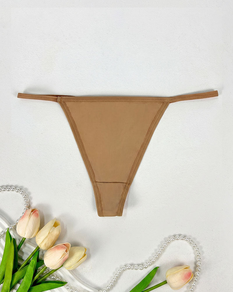 Seamless low-rise thong panties in tan, smooth minimal-coverage design.