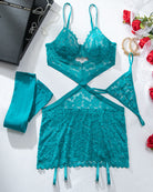Teal lace chemise with cutout front, scalloped hem, and garter strap details