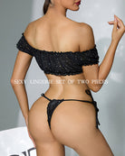 Black off-shoulder lingerie set, back view: rhinestone crop top and tie-side thong