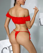 Red off-shoulder lingerie set, back view: rhinestone crop top and tie-side thong