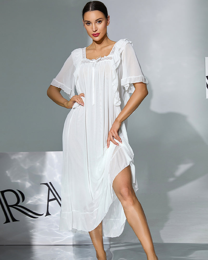White layered nightgown with ruffled shoulder detailing and knee-length tiered hem
