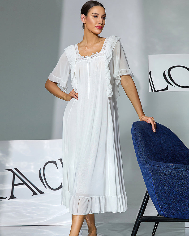 White ruffle-front nightgown with lace-style neckline and short flutter sleeves
