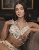 Pearl halter top with layered bead fringe, butterfly ornament at center