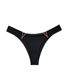 Black thong panties with copper-tone V metal accents, minimal coverage.