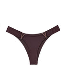 Dark brown thong panties with copper-tone V metal accents, minimal coverage.