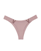 Pink minimal-coverage thong panties with V-shaped metal accents at the sides