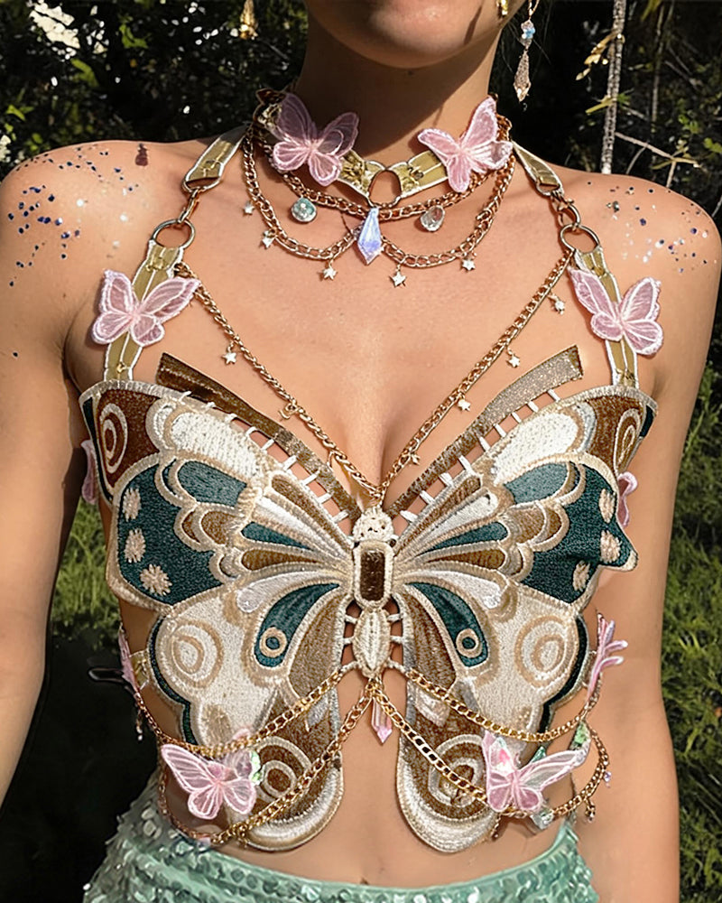 Embroidered butterfly corset top with layered gold chains and pearl accents, butterfly appliques