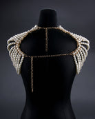 Pearl shoulder chain accessory with multi-strand pearl drape and gold links
