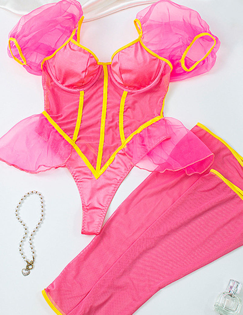 Pink sheer bodysuit with puff sleeves, yellow piping, and matching long stockings.