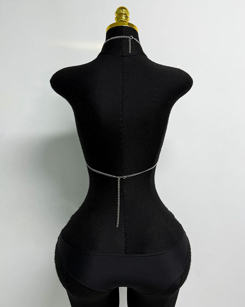 Multicolor beaded pom-pom body chain shown from back with thin central clasp