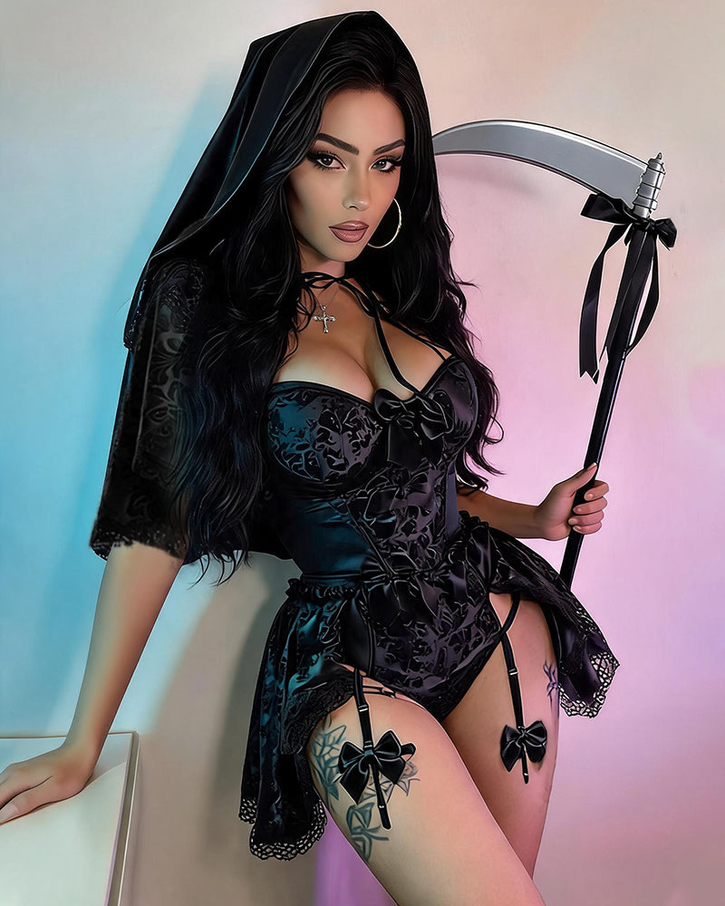 Black corset dress with long cape hood, lace trim, ribbon bows, and tie details