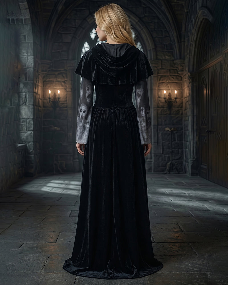 Black long sleeve maxi dress with hooded cape, back view, ankle-length flowing skirt