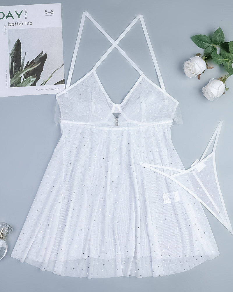 White sheer glitter mesh babydoll dress flat lay with crisscross open back straps