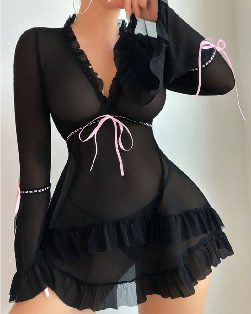 Black sheer mesh chemise with ruffled neckline, long sleeves, and bow trim accents