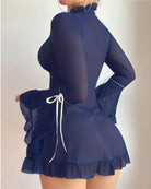 Dark blue sheer mesh chemise with ruffled hem and bow-tie detail at the back