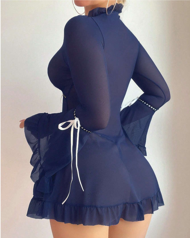 Dark blue sheer mesh chemise with ruffled hem and bow-tie detail at the back