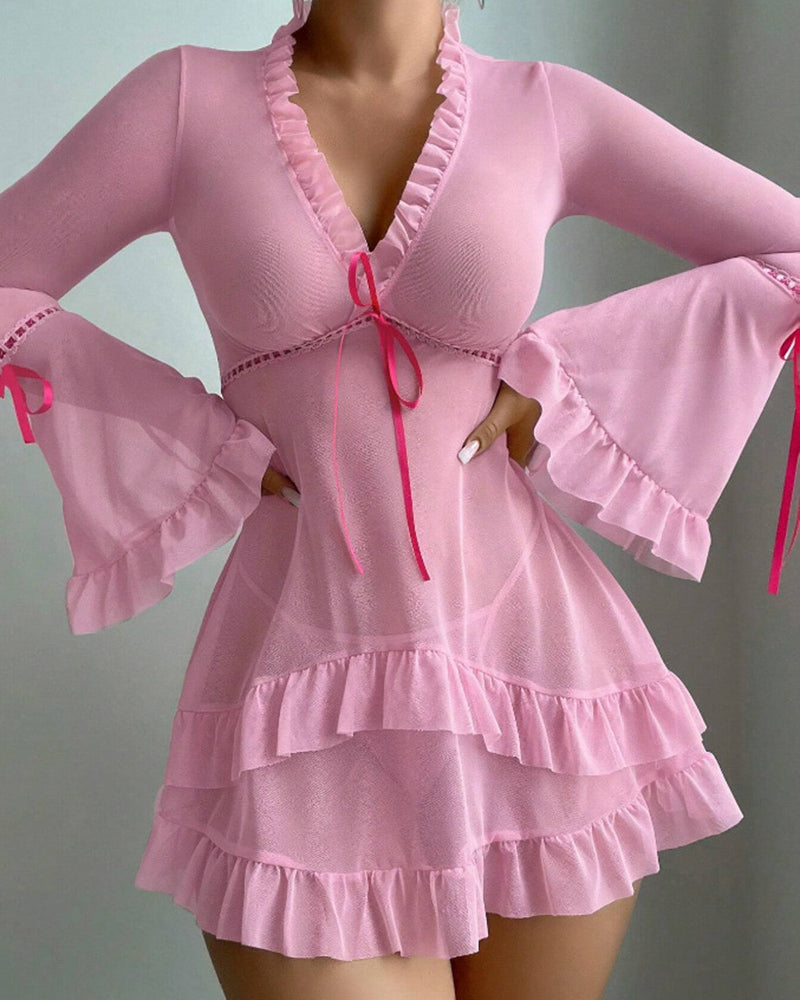 Pink sheer mesh babydoll chemise with ruffled trim, long sleeves, and ribbon tie front