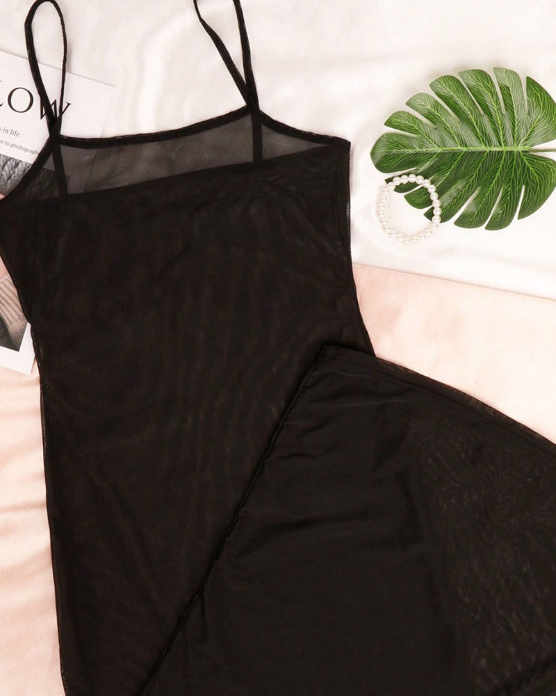 Black sheer mesh lingerie dress close-up, thin straps and long bodycon shape