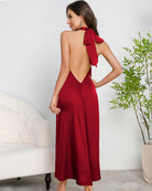 Red satin halter maxi dress, open back with bow tie and V-back