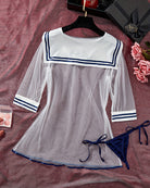 Sheer sailor-style mesh dress with navy collar trim and thong