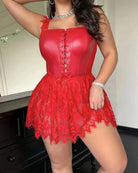 Red faux leather corset lingerie with lace skirt, eyelet front and boned panel detail