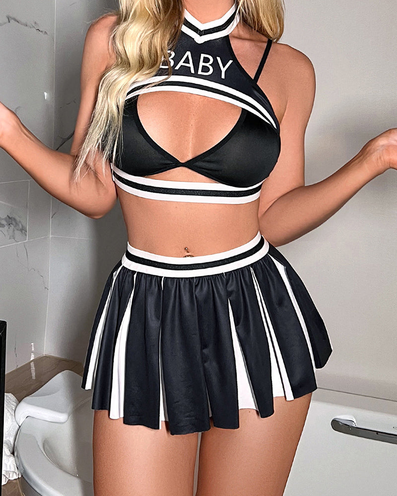 Black cheerleader lingerie set with cut-out bra and pleated skirt, striped trim