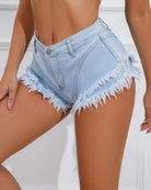 Cerulean blue low rise denim hot shorts with frayed hem and button fly