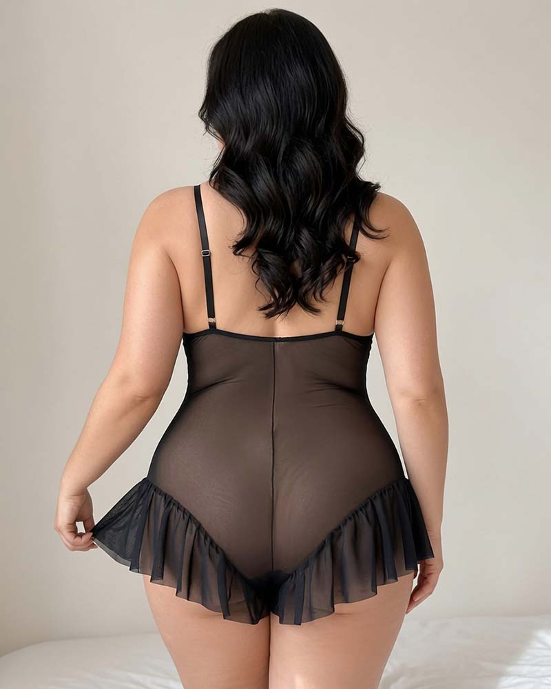Black floral lace bodysuit, back view with adjustable straps and ruffle hem