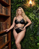 Black strappy bralette and high-waist brief lingerie set with cutout front details