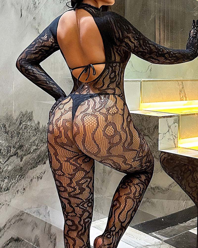 Black sheer lace bodysuit with crisscross back straps, long sleeves, high-cut leg