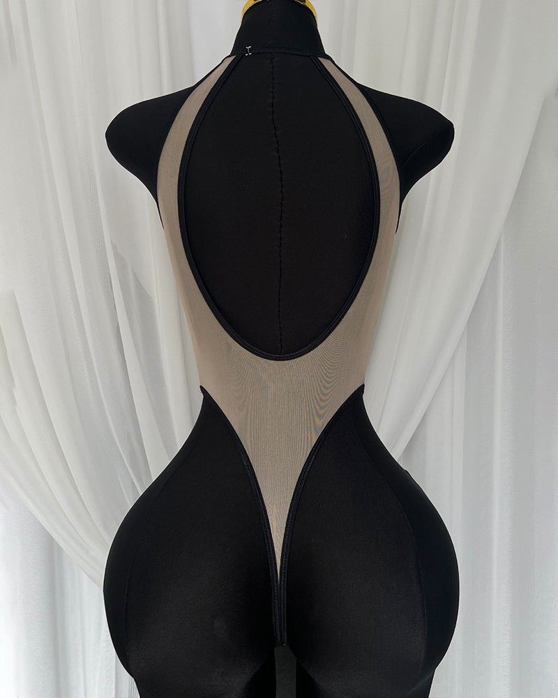 Sheer mesh bodysuit in black with rose print, open back and V-front