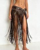 Coffee-brown PU wrap skirt with long fringe and studded waist belt