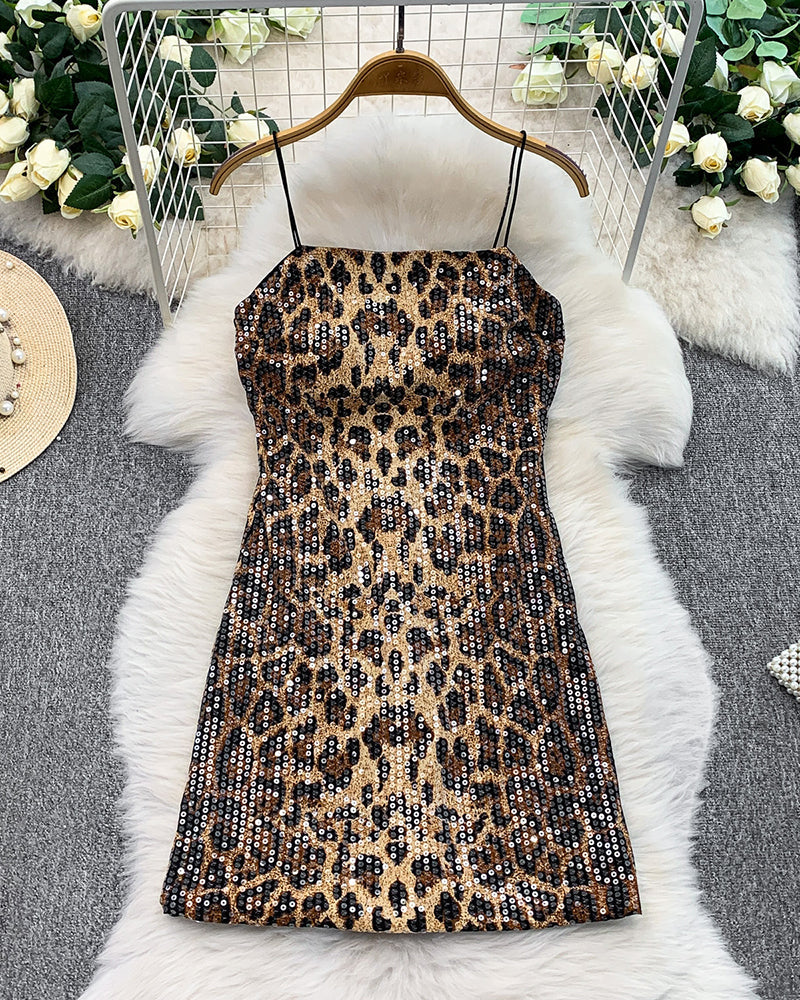 Leopard sequin mini dress on hanger, spaghetti straps, fitted silhouette